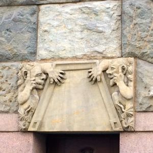 Finnish art deco trolls seen on a period building